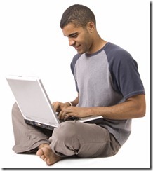 Teenager surfing the web on a laptop